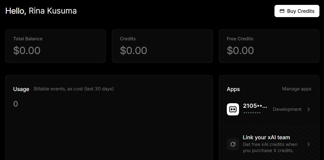 Dasbor X Developer Console sesudah mendaftar: sapaan "Hello, Rina Kusuma" dan tombol "Buy Credits", tiga kartu Total Balance $0.00, Credits $0.00, Free Credits $0.00, kartu Usage bernilai 0, dan kartu Apps berisi satu app berstatus Development.